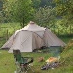 Vaude Badawi II tent pitched beside a campfire in the Lake District