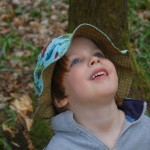 Child in the woods at Forgewood campsite