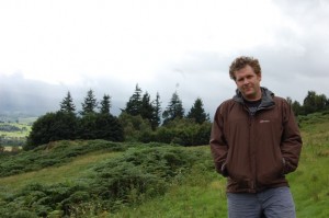 Matthew De Abaitua walking in the hills in Comrie Crieff, Scotland